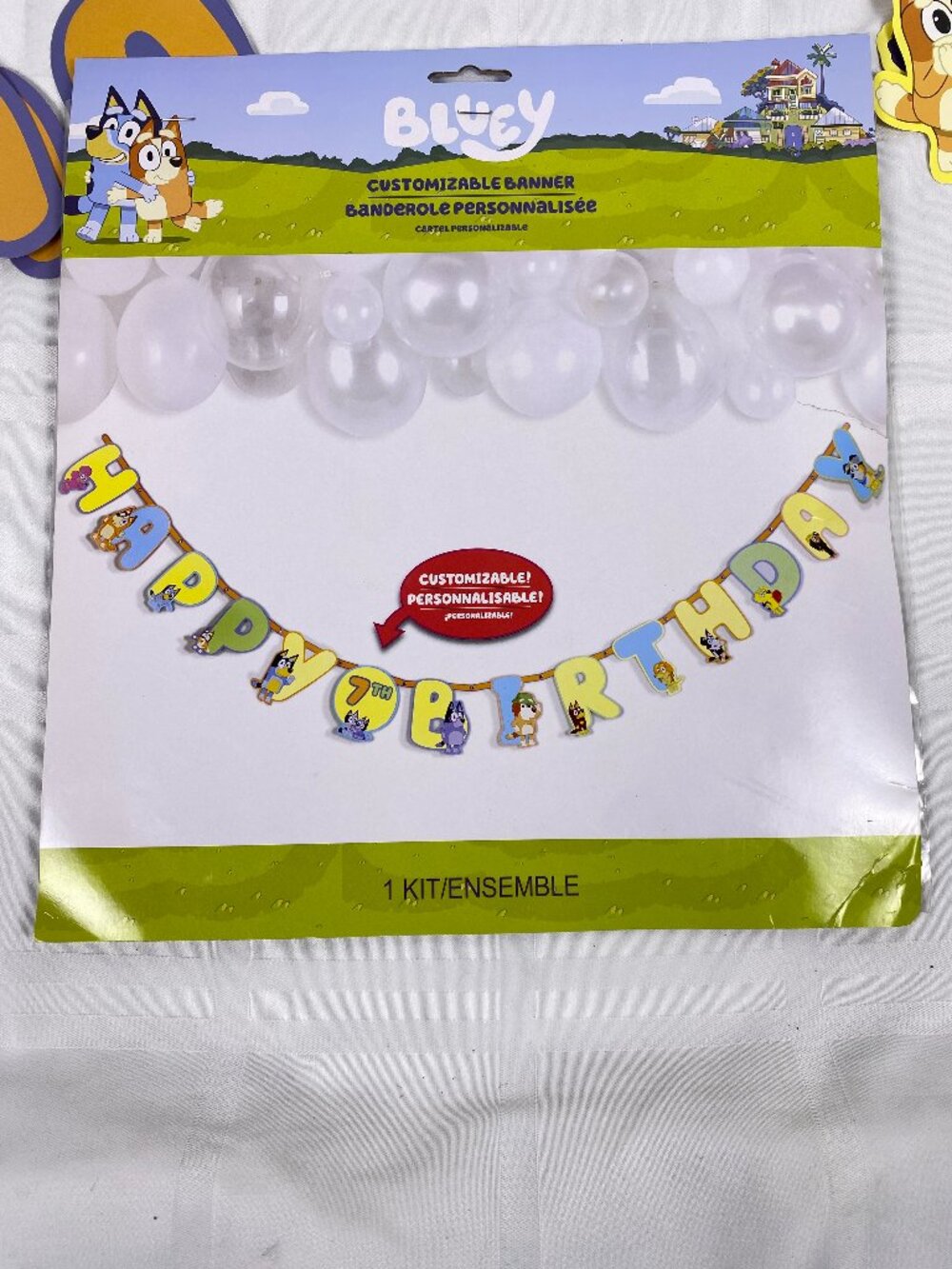 Bluey Customizable Banner. Added in 11 spiral hanging deco pieces